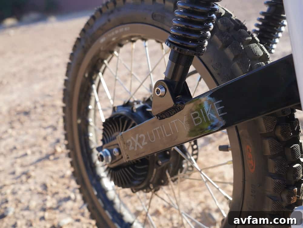 UBCO 2x2 electric bike with a large backpack on the rear