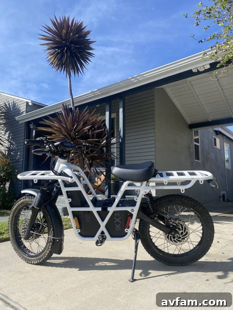 UBCO 2x2 electric bike parked in a forest clearing