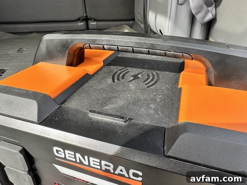 Phone wirelessly charging on top of the Generac GB1000.