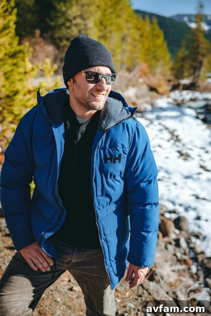 Man looking at view in Helly Hansen coat