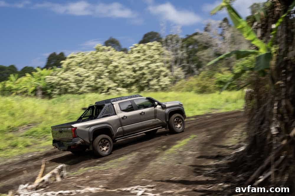 Action shot of 2024 Toyota Tacoma Trailhunter on a trail