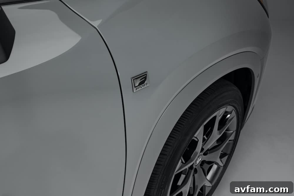 Full side profile of the Lexus TX in motion.