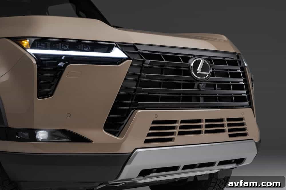 Another action shot of the 2024 Lexus GX Overtrail on a dirt path with blurred background