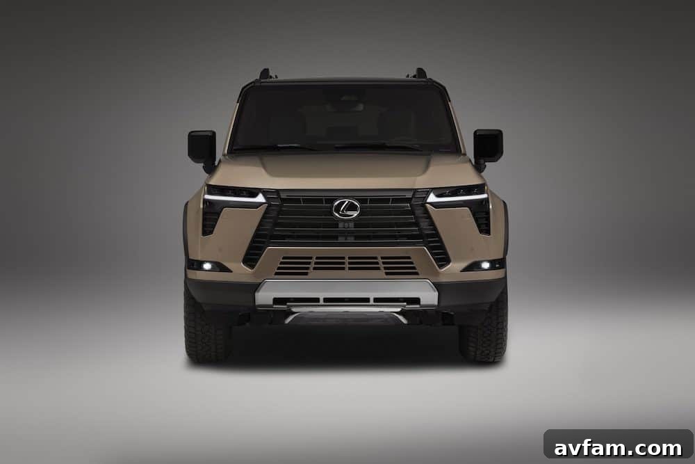 2024 Lexus GX Overtrail parked by a scenic lake with mountains in the background, perfect for overlanding
