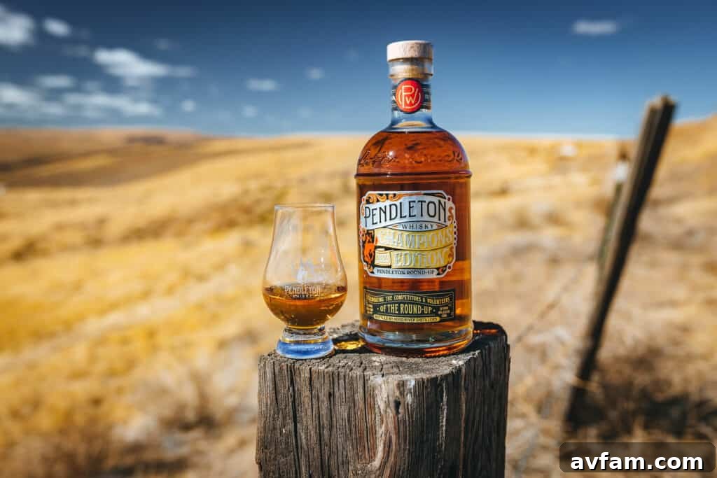 Pendleton Whisky and the Round-Up A bottle of Pendleton Whisky with the rodeo arena in the background, symbolizing the partnership