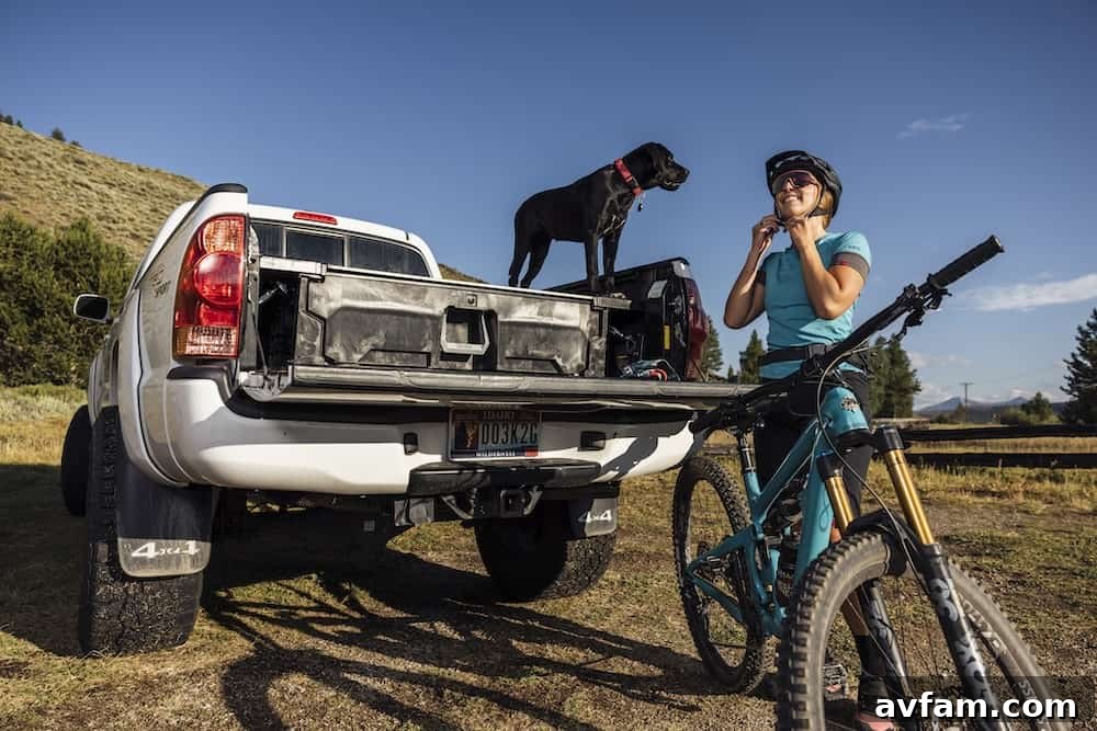 A mid-size pickup truck with the DECKED Super Drawer fully extended, revealing massive storage capacity.