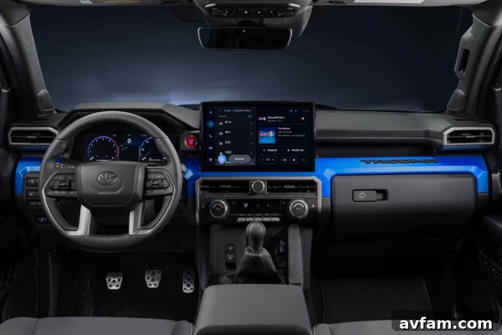 2024 Toyota Tacoma driving at dusk