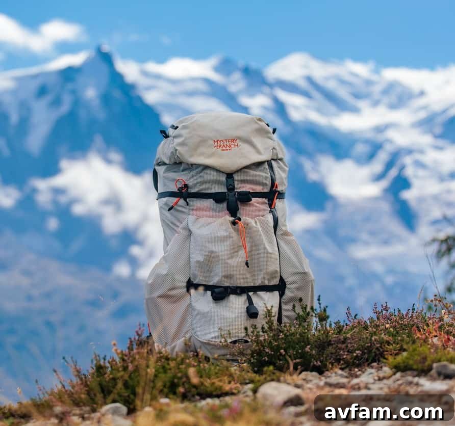 Mystery Ranch Radix Series backpack in a mountainous landscape, highlighting its rugged design for backcountry adventures.