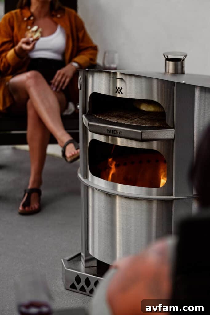 A family gathered around the Breeo X24 fire pit, enjoying the warmth and ambiance.