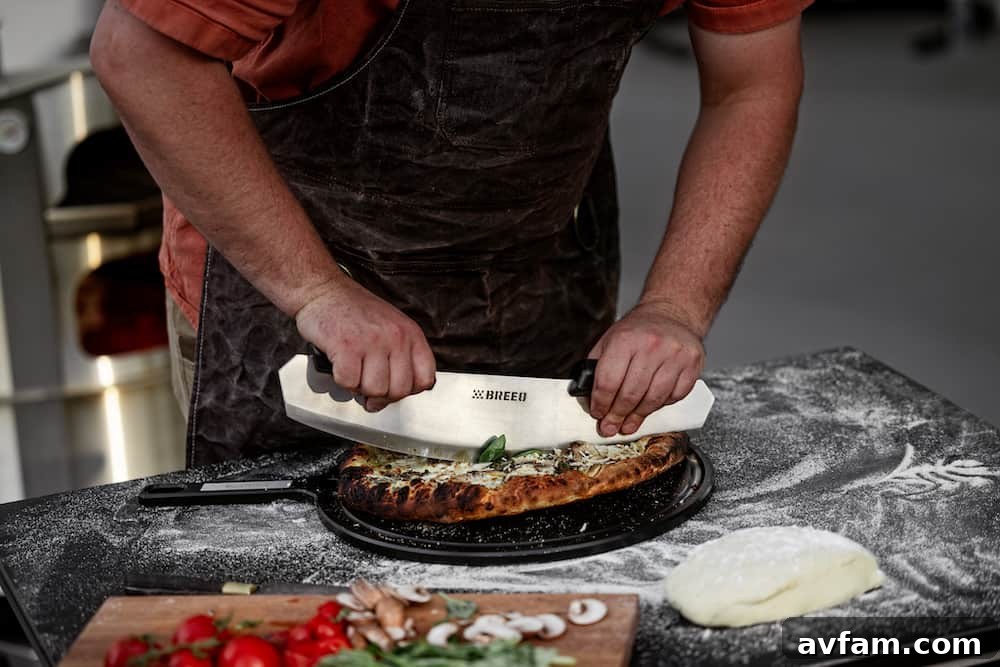 Various Breeo pizza oven accessories displayed, including a peel, rocker, and serving board.