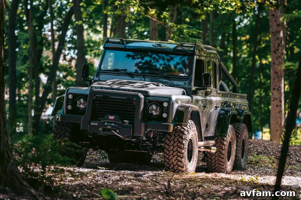 Side profile of the Manz Defender 6x6 on display