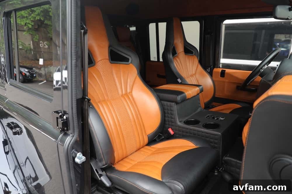 Rear view of the Manz Defender 6x6 with spare tire