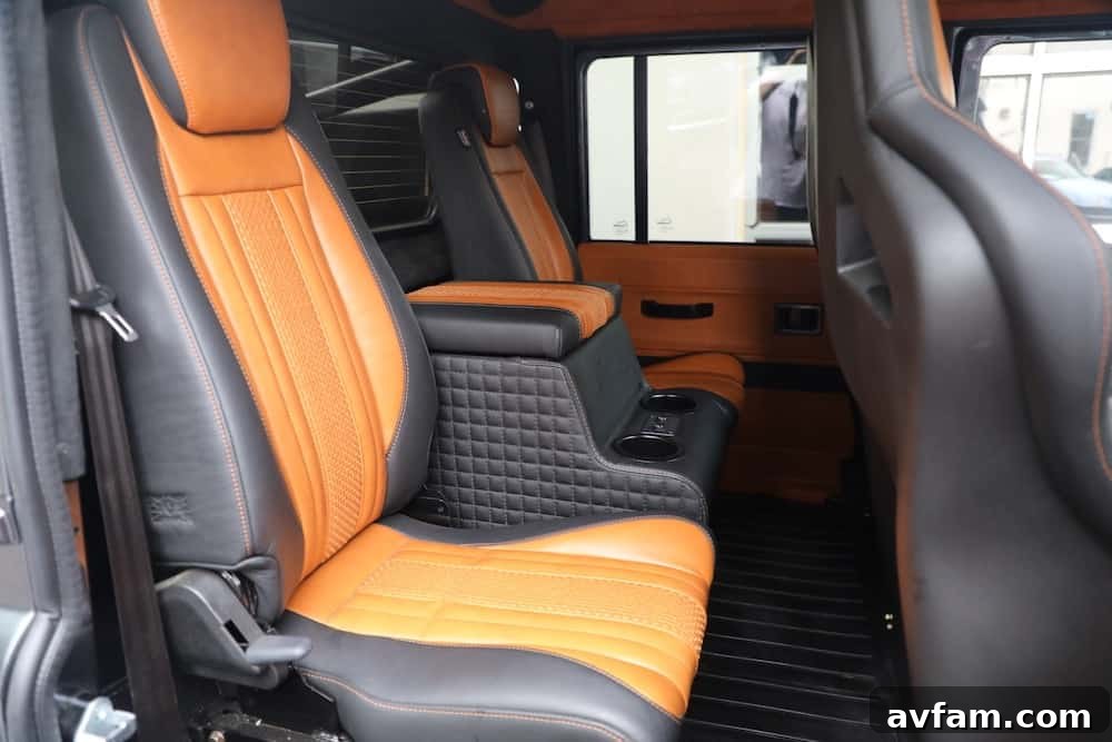 Front three-quarter view of the custom Defender 6x6
