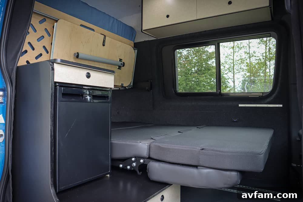 Alpaca Van Upper Storage Alpaca camper van interior showing upper cabinets and lighting