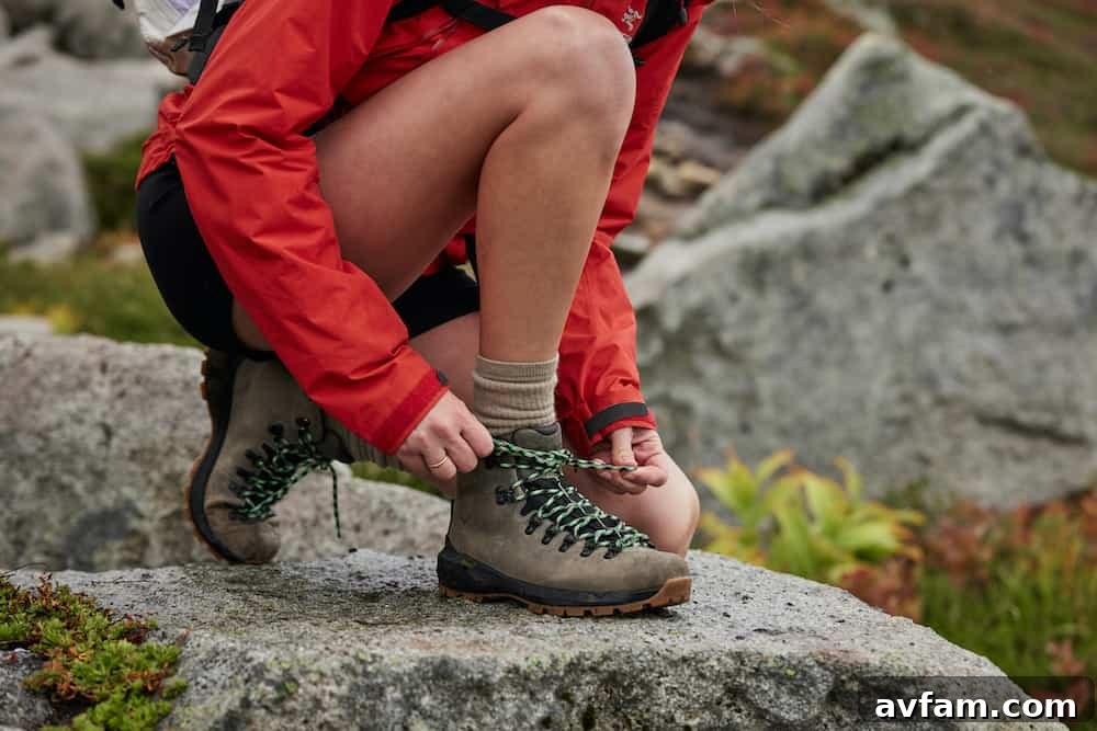 Danner Mountain 600 EVO boots in a forest setting, ready for hiking.