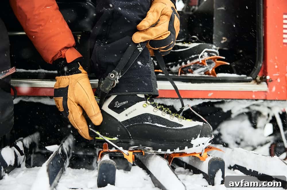 Danner Mountain 600 EVO boot with detailed close-up of the sole on an outdoor surface.