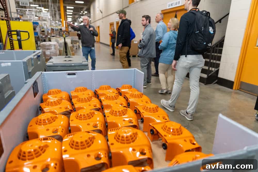 Stihl Battery Blowers & Trimmers A lineup of Stihl battery-powered blowers and trimmers, ready for use, emphasizing clean and efficient operation.