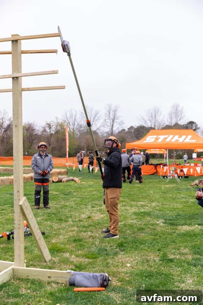 Stihl Expert Guidance A Stihl representative providing instructions and insights on the proper use of battery-powered equipment to an eager participant.
