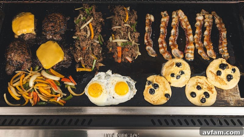 Recteq SmokeStone 600 large cooking surface with multiple food items