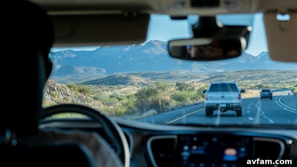 A modern SUV equipped with a throttle controller, ready for an adventure on a scenic highway, showcasing enhanced vehicle control.