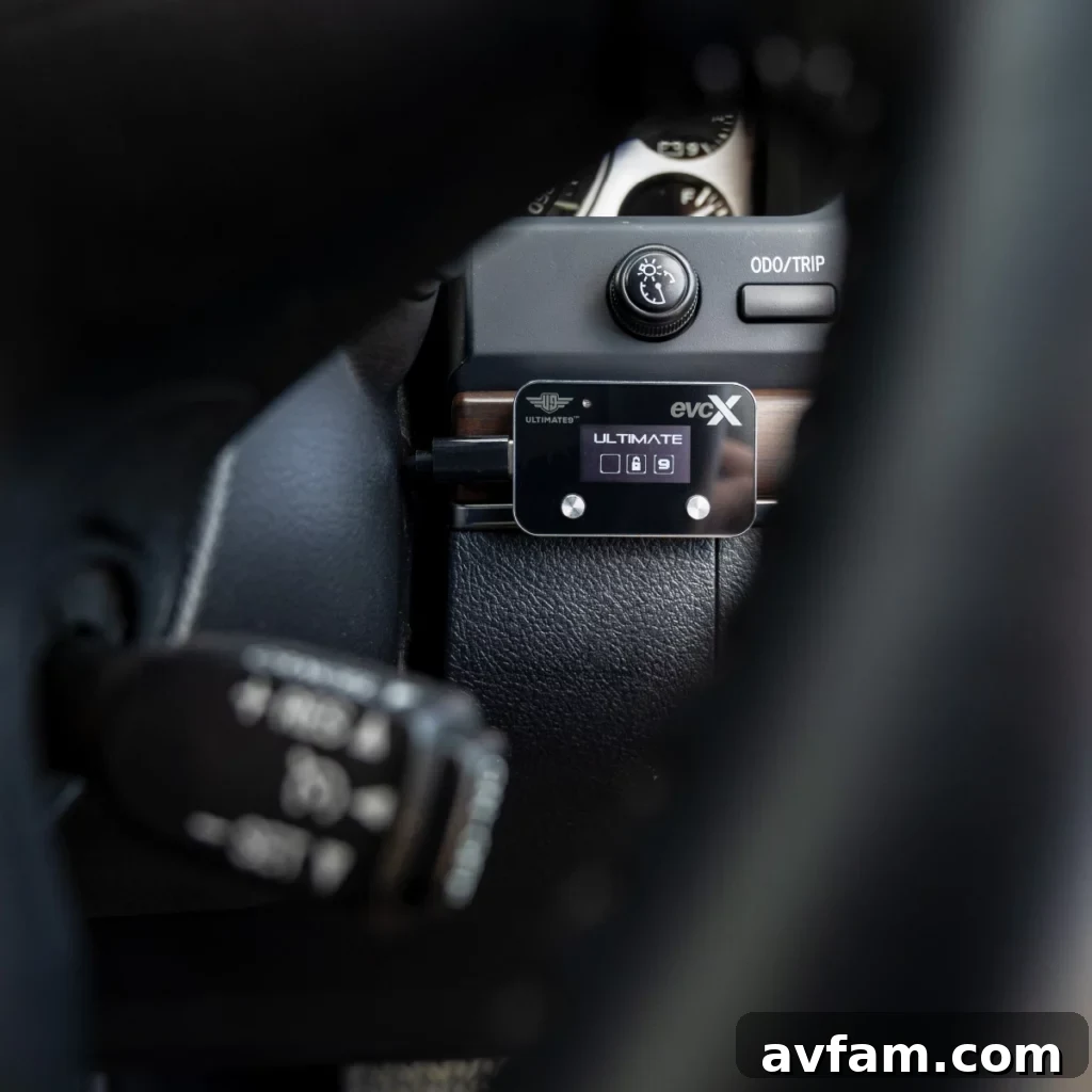 Close-up of the Ultimate9 evcX throttle controller, emphasizing its compact design and easy plug-and-play installation.
