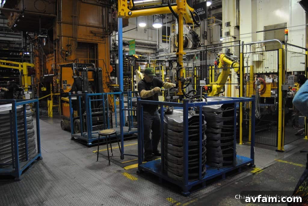 A collection of vibrant John Deere components organized for efficient assembly