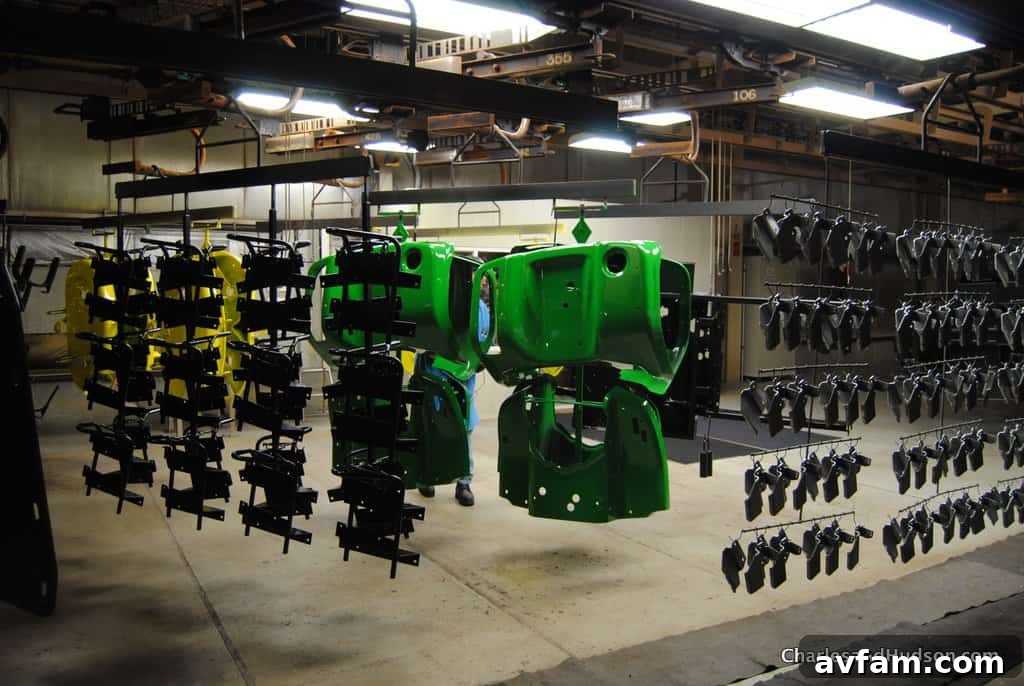 John Deere lawn tractors moving along the conveyor belt in the final assembly phase