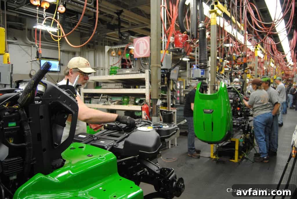 Robotics performing delicate tasks on a John Deere component