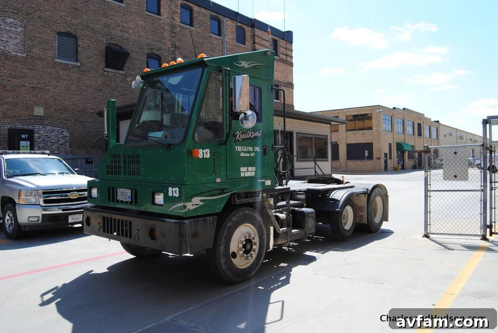 Assembly of various John Deere lawn and garden equipment in progress