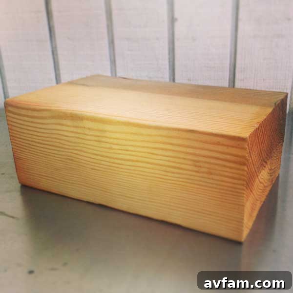 Solid wood block ready for transformation into a succulent planter, showcasing raw material for DIY project.