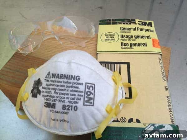 Safety gear including 3M Advanced Abrasives sandpaper and 3M Tekk Protection safety glasses and respirator.