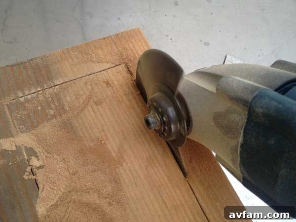 Oscillating tool with wood cutting attachment for initial carving attempts.