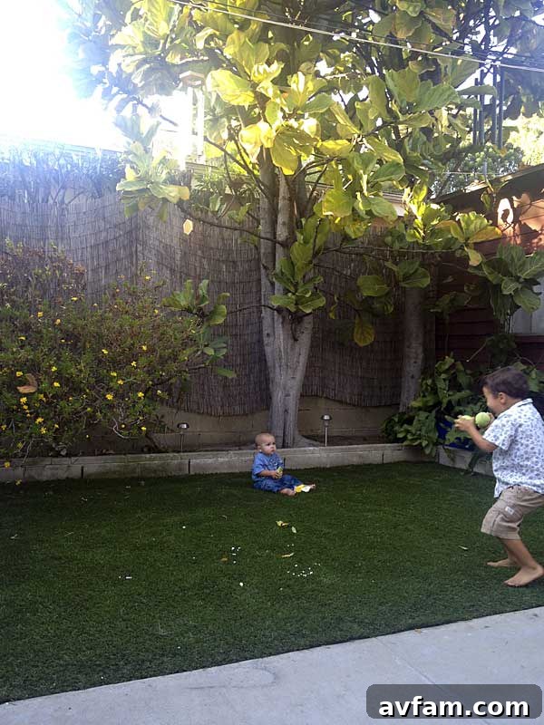 A baby crawling and exploring on the soft, clean SynLawn artificial grass, highlighting its safety and comfort for even the youngest family members