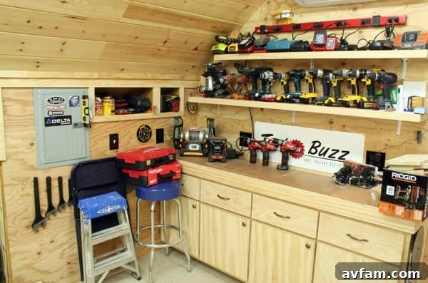 Organized tool battery storage wall mount for a modern workshop.