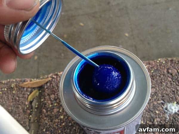 Applying PVC Cement for Sprinkler Pipe Repair Applying PVC Cement for Sprinkler Pipe Repair