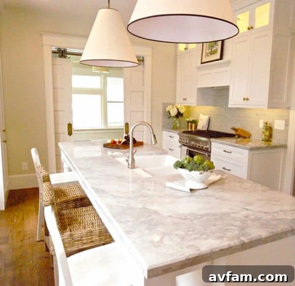 Luxurious marble kitchen countertops, often favored for elegant baking and pastry stations due to its cool surface