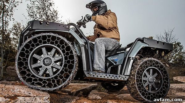 Polaris Sportsman WV850 H.O. Polaris Sportsman WV850 H.O. navigating challenging terrain with TerrainArmor tires