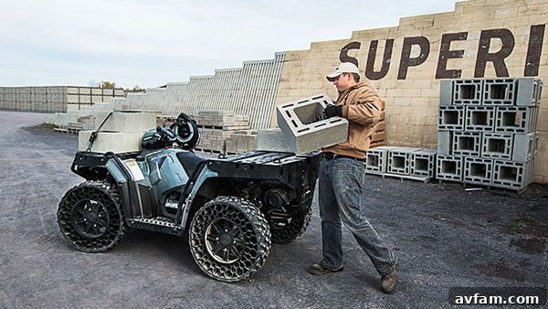 TerrainArmor in Action Polaris Sportsman WV850 H.O. navigating an obstacle course, showcasing tire flexibility