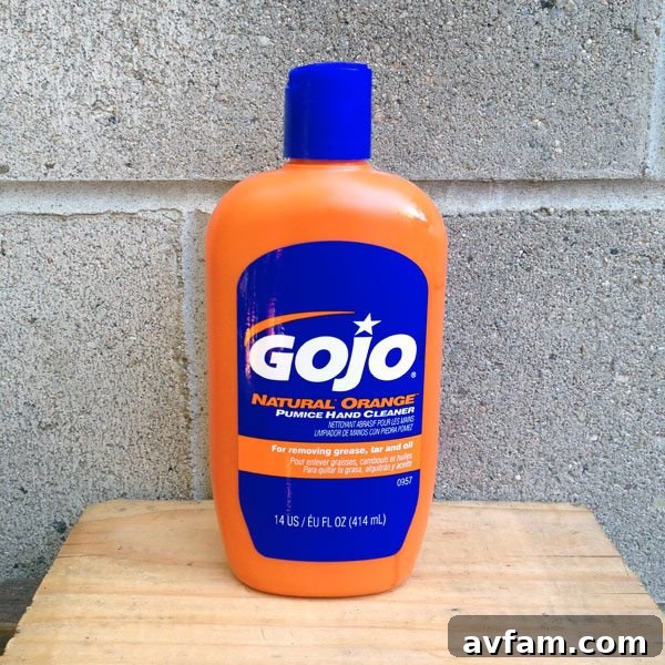 GoJo Natural Orange Pumice Cleaner in a squeeze bottle, highlighting its texture.