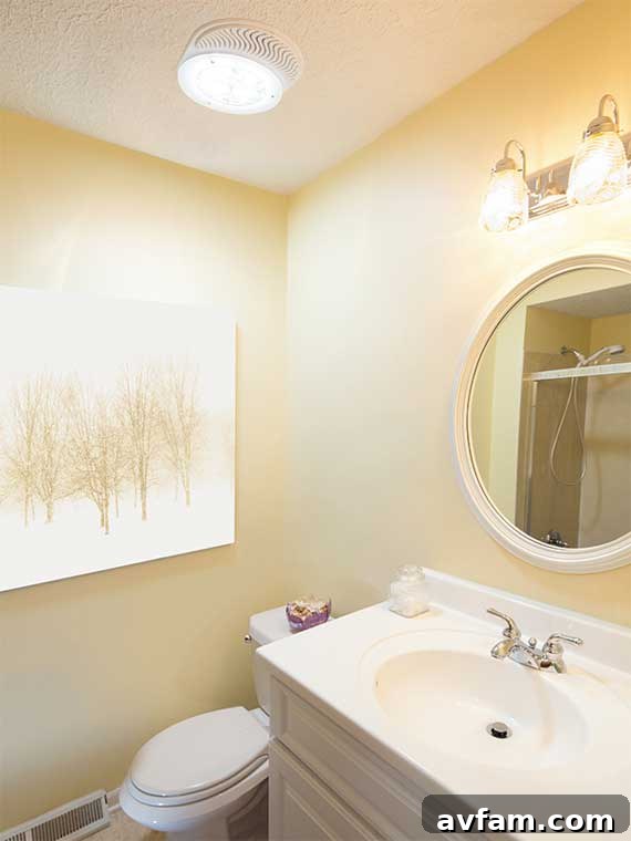 Yellow-themed bathroom brilliantly lit by Solatube