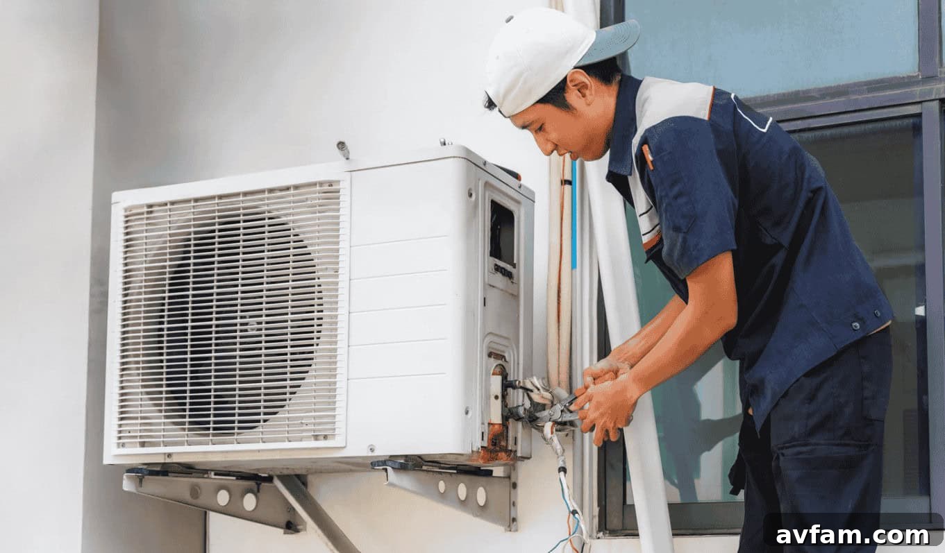 HVAC Filter Replacement Guide man fixing HVAC filter