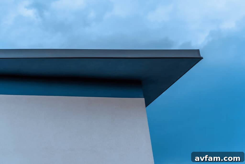 Modern flat roof building against blue sky