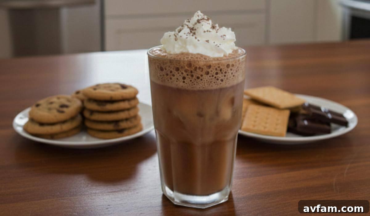 Glass of chocolate milkshake with cookies