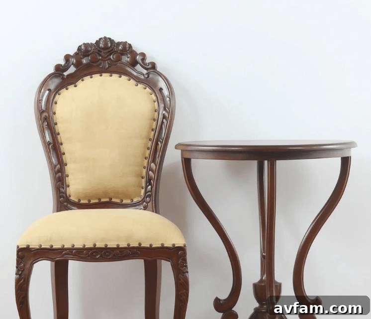 Styling Heirloom Furniture in Contemporary Homes 3 old chairs with intricate details, set in a modern, uncluttered space, highlighting the beauty of vintage furniture