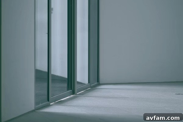 Empty room with glass doors, a common home security