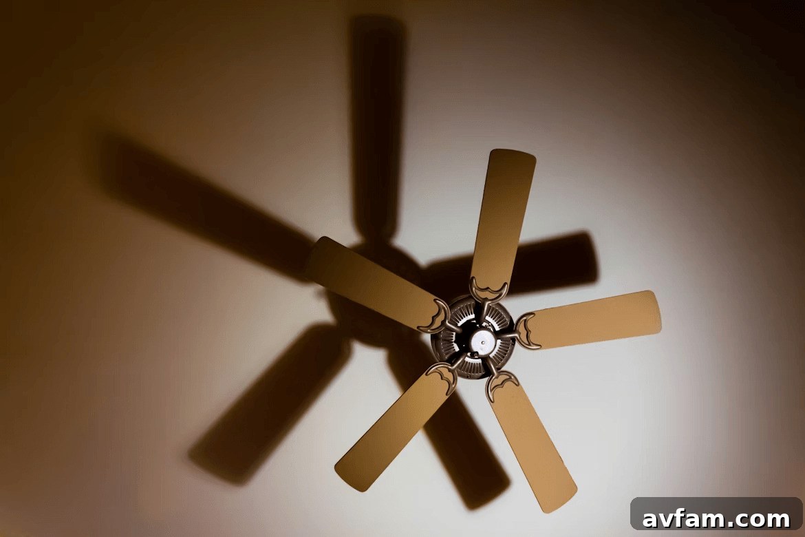 Four-blade ceiling fan providing summer comfort
