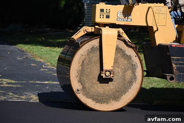 Freshly repaired asphalt driveway showing a clean, dark surface