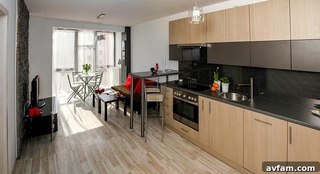 Modern and clean apartment kitchen with stainless steel appliances, a key feature for attracting rental leads