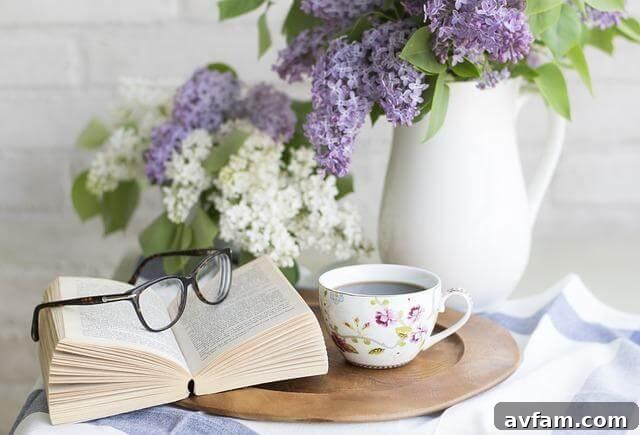 Shake Up Your Steep With 7 New International Tea Day Traditions 2 A serene morning scene with a cup of tea and an open book on a small plate