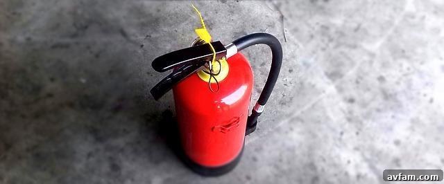 Red fire extinguisher for home safety
